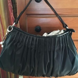 NEver used.  White House//Black market purse